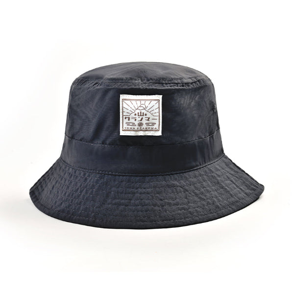 Black Yama Workwear Bucket Hat with black and white logo patch at Grandmama Store in Hong Kong.