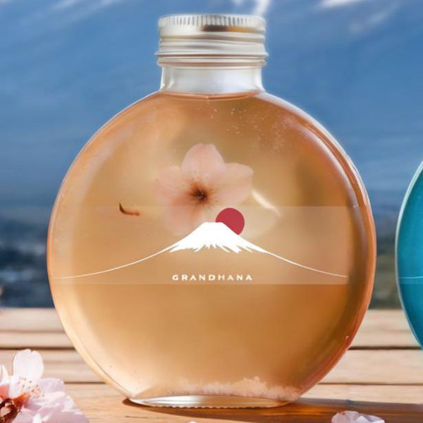 Clear glass bottle of Sakura Lychee Flower Tea with cherry blossom petal at Grandmama Store in Hong Kong