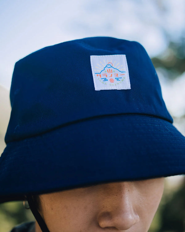 Close-up of the navy blue Yama Workwear Bucket Hat with logo patch at Grandmama Store in Hong Kong.