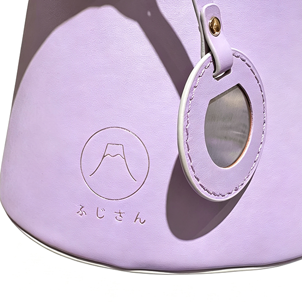 Debossed logo detail on Violet lavender Mt. Fuji Goen Bag at Grandmama Store in Hong Kong
