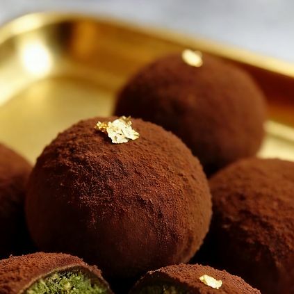 Dubai Chocolate Chewy truffles served on a gold tray at Grandmama Store in Hong Kong
