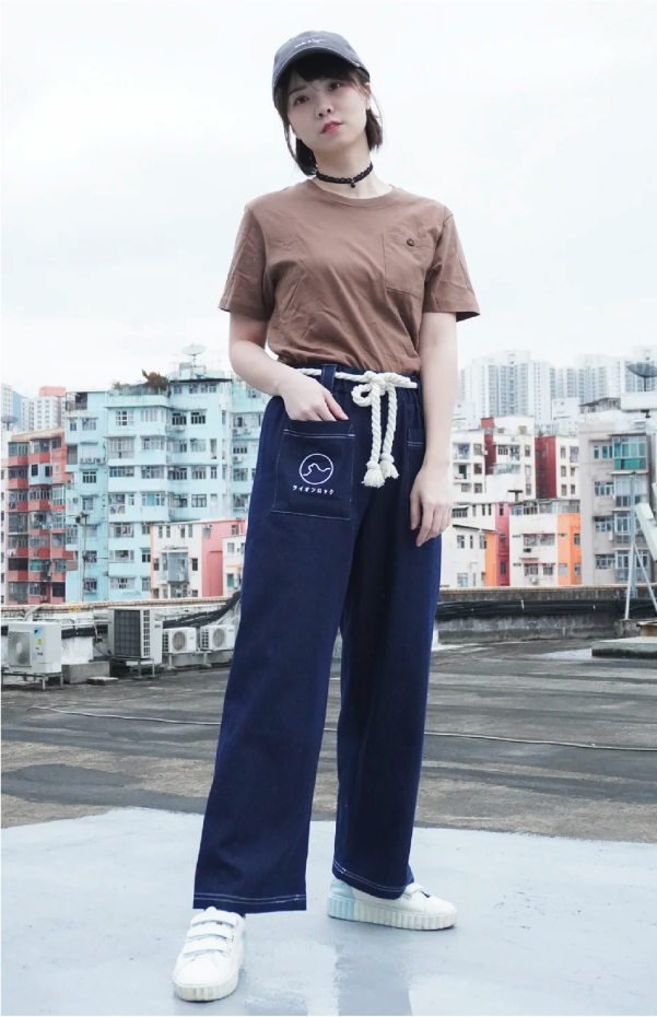 Female model wearing navy blue Kamon Japanese Waist Rope Pants-Lion Rock at Grandmama Store in Hong Kong