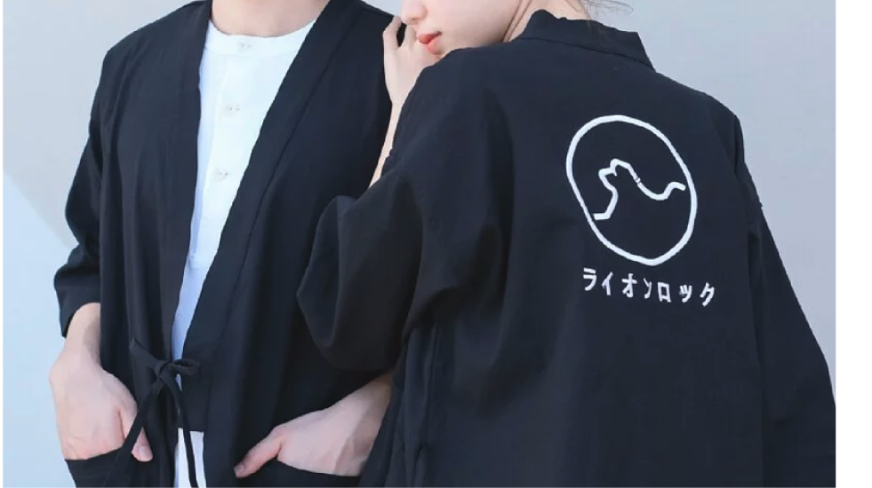 Front and back studio view of models in black Kamon Kimono Jacket-Lion Rock at Grandmama Store in Hong Kong
