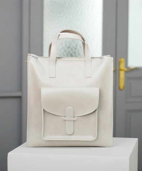 Front view of off-white Vintage Soft Leather Convertible Bag at Grandmama Store in Hong Kong