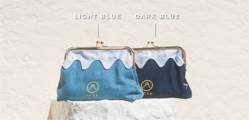 Front view of the denim Mt. Fuji Pocket Bag with kiss-lock closure in Light Blue and Dark Blue colorways at Grandmama Store in Hong Kong.