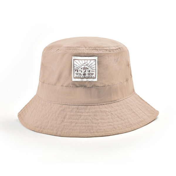 Khaki beige Yama Workwear Bucket Hat with black and white logo patch at Grandmama Store in Hong Kong.