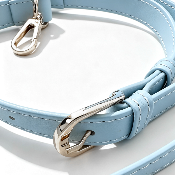 Light blue leather strap hardware on Mt. Fuji Goen Bag at Grandmama Store in Hong Kong