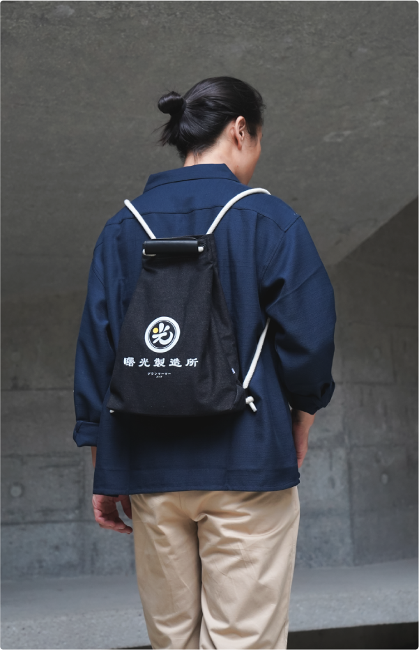 Light of Dawn Sake Bag Black Denim dual-strap backpack lookbook photo at Grandmama Store in Hong Kong.