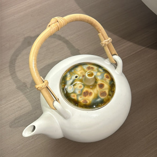 Marbled clay teapot with mustard-brown marbled lid at Grandmama Store in Hong Kong