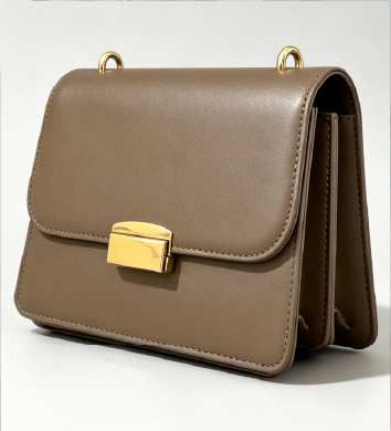 Multi-compartment studio shot of taupe Square Side Bag with Gold Buckle at Grandmama Store in Hong Kong