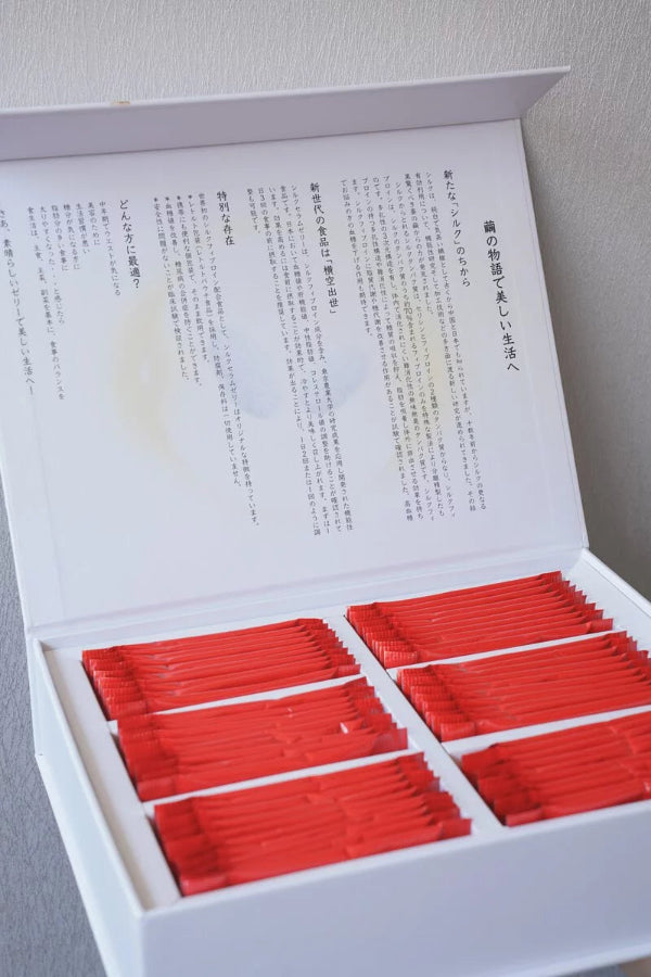 Open Silk Serum Jelly packaging box with red sachets and printed Japanese details at Grandmama Store in Hong Kong.