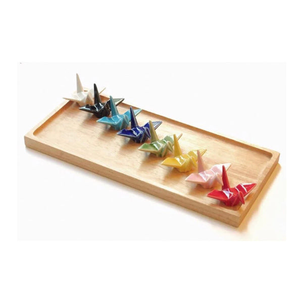 Origami-style Celebration Crane Chopstick Rests set on bamboo tray at Grandmama Store in Hong Kong