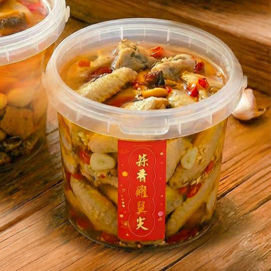 Plastic tub of Grandmama Garlic Chicken Wing Tips at Grandmama Store in Hong Kong