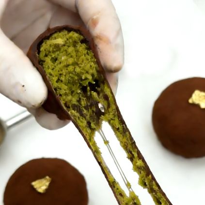 Preparation process of filling Dubai Chocolate Chewy with pistachio kataifi at Grandmama Store in Hong Kong