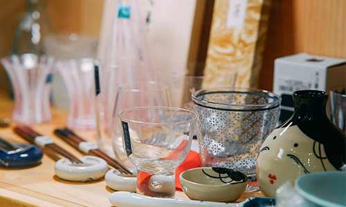 Store interior displaying Japanese glassware, chopsticks, and ceramic tableware at Grandmama Store in Hong Kong.