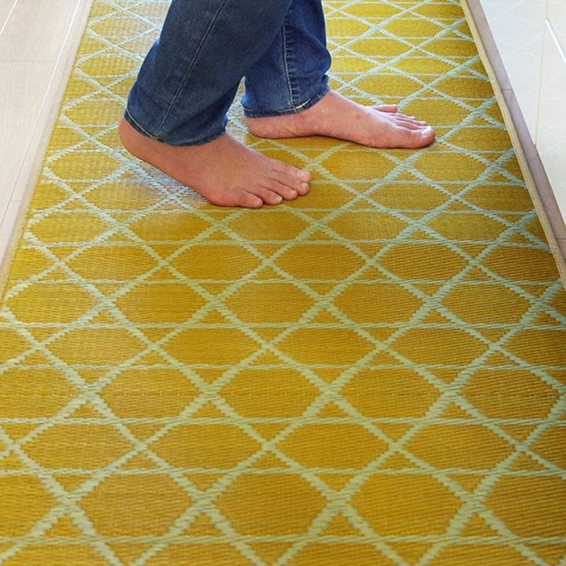 Walking barefoot on yellow IGUSA Rush Grass Floor Mat (Kyukawa Series) at Grandmama Store in Hong Kong