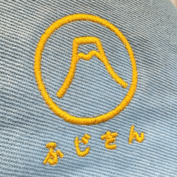 Yellow embroidery detail on Light Blue canvas Mt. Fuji Sake Bag at Grandmama Store in Hong Kong