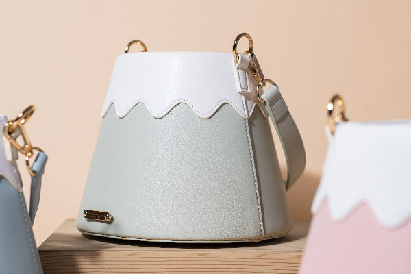 Pastel green and white Mt. Fuji Goen Bag in Forest colourway with textured leather at Grandmama Store in Hong Kong.